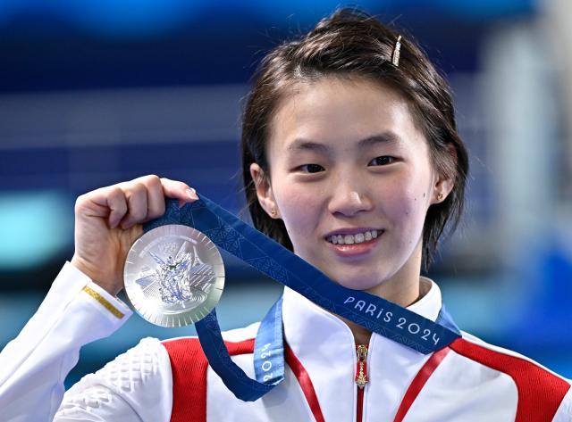 pg电子经验-陈芋汐再获银牌 从预赛到半决赛再到决赛愈发坚定